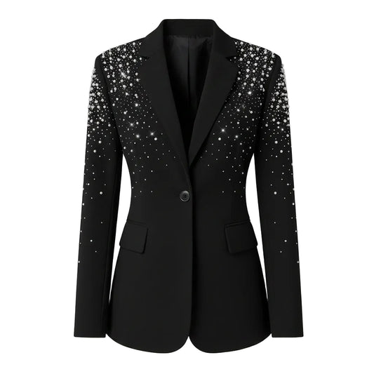 Black sequin blazer worn by a person against a gray background