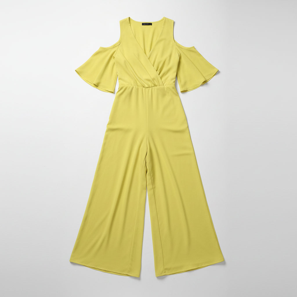 Yellow cold-shoulder jumpsuit worn by a model on a white background