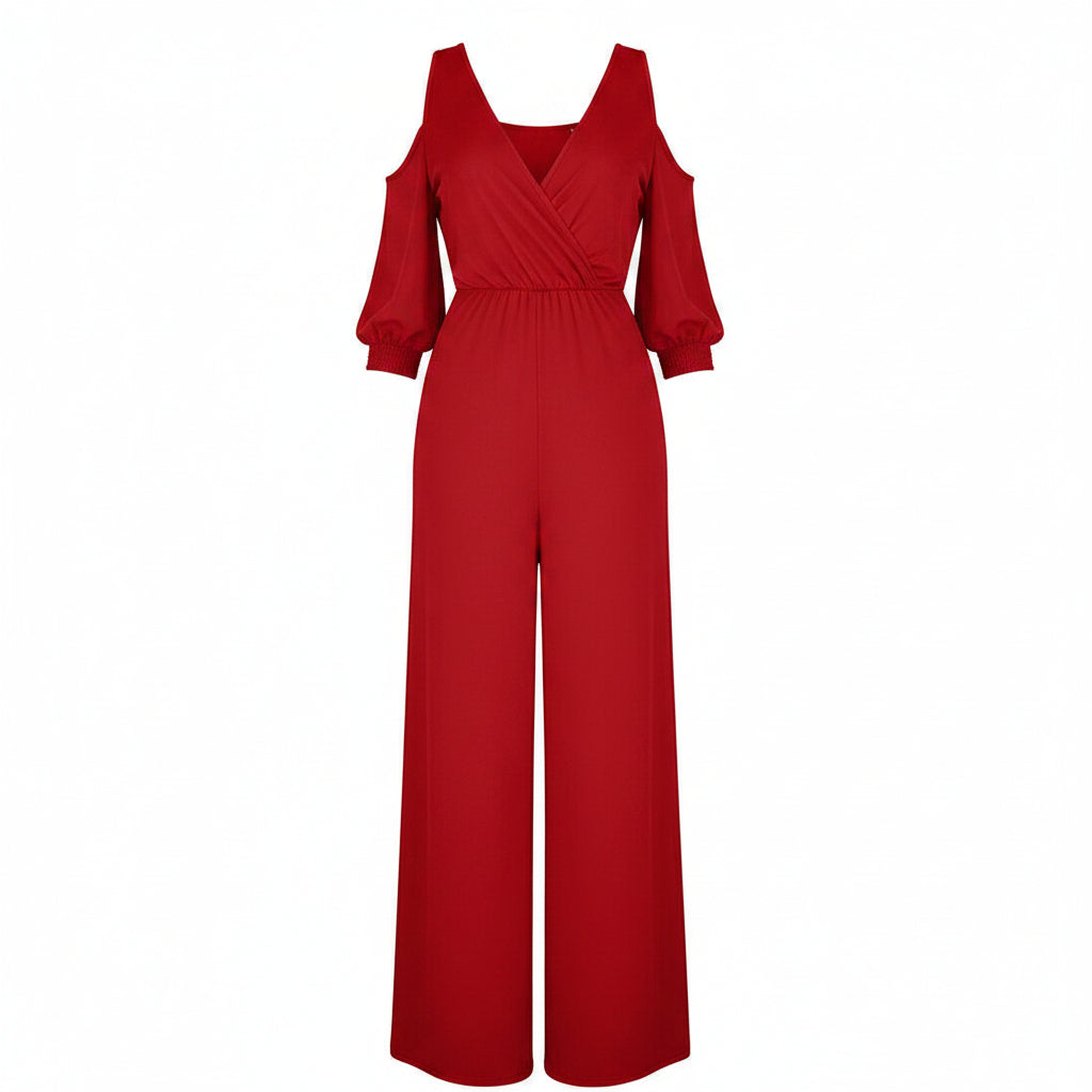 Red jumpsuit worn by a model on a white background